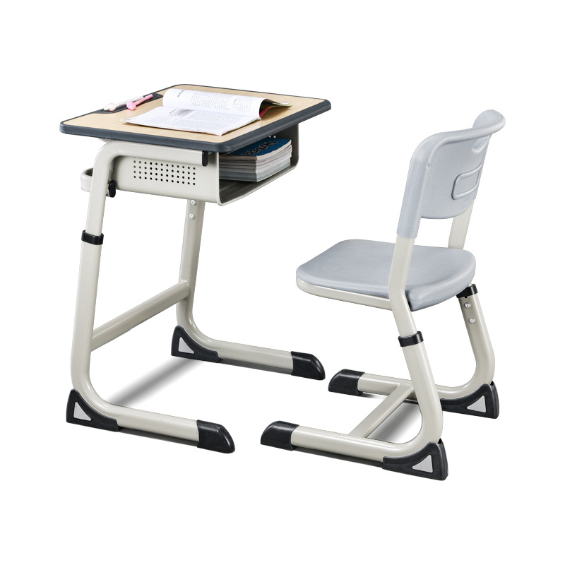 14338563084_638508525.jpg Primary and middle school students lifting desks and chair - Image 1