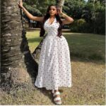 White sleeveless halter neck dress