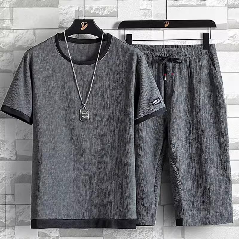 O1CN01pLHCuZ1E1K7YGxVCc_21212216149690291-0-cib.jpg Summer casual sports suit for men, ice silk short-sleeved T-shirt and shorts - Image 1